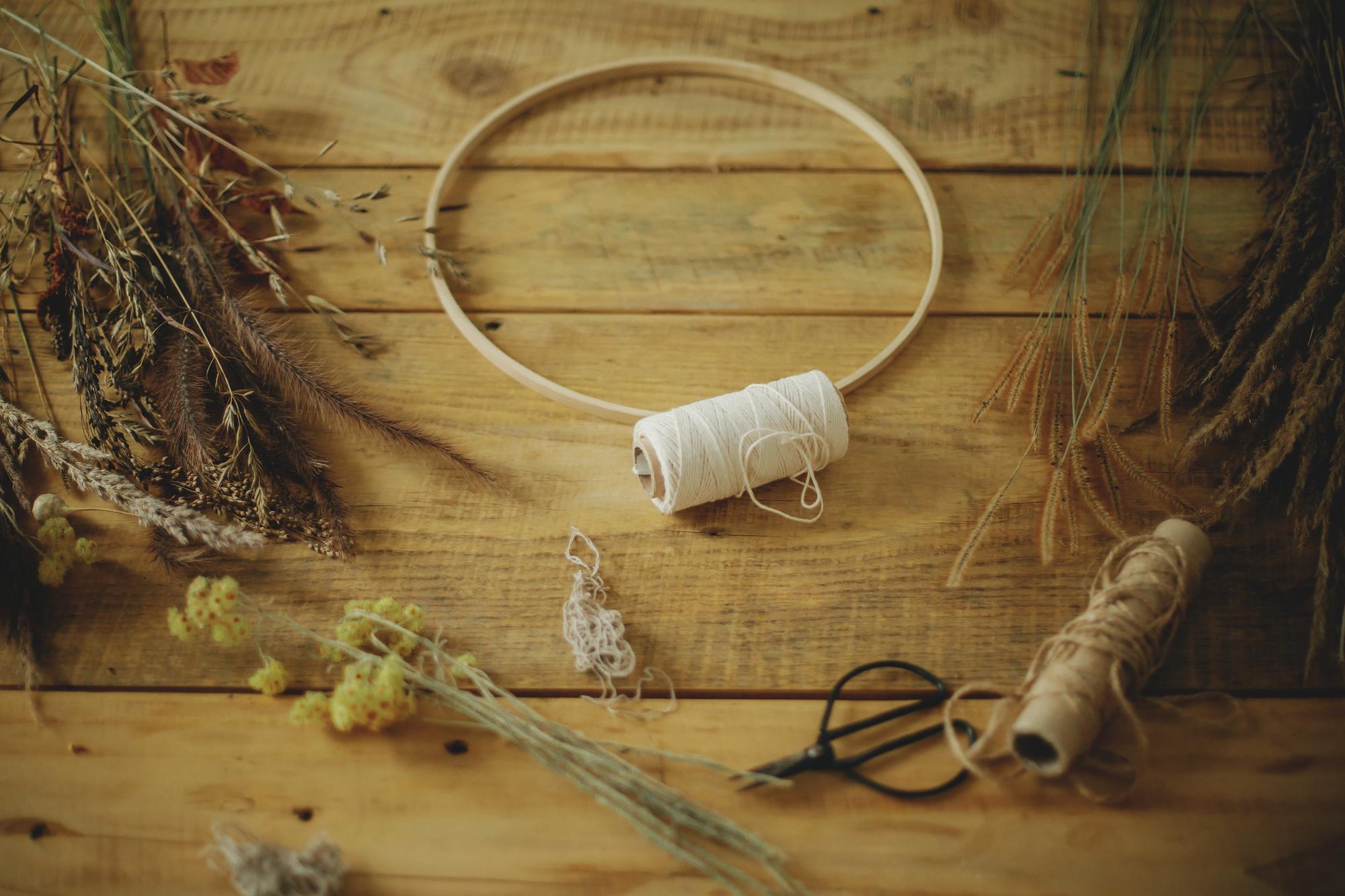 atelier workspace with hoops and threads